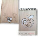 Libreta vertical manzana feliz día o manitos coraz